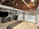 Bedroom with exposed beams, open ceilings, and a mezzanine office at 735 Lexington Ave # 23, Indianapolis, IN 46203
