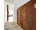 Hallway featuring wooden barn doors and hardwood flooring at 735 Lexington Ave # 23, Indianapolis, IN 46203