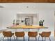 Eat-in kitchen featuring barstool seating and stainless steel appliances at 735 Lexington Ave # 23, Indianapolis, IN 46203