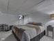 Finished basement bedroom with carpeting, natural light, and comfortable decor at 748 Woodcreek Ct, Greenwood, IN 46142