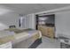 Finished basement bedroom with carpeting, modern media setup, and ample space at 748 Woodcreek Ct, Greenwood, IN 46142