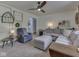 Spacious living room with a sectional sofa, recliner, and stylish decor creating a comfortable living space at 748 Woodcreek Ct, Greenwood, IN 46142
