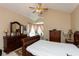 Bedroom with vaulted ceilings, ceiling fan, and natural light at 7608 Harbour, Indianapolis, IN 46240
