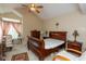 Bedroom with vaulted ceilings, ceiling fan, and neutral decor at 7608 Harbour, Indianapolis, IN 46240