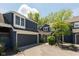 Charming two-story home with a driveway and attached garage on a sunny day at 7608 Harbour, Indianapolis, IN 46240