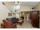 Open-concept living room with stairs, dining area, and kitchen view at 7608 Harbour, Indianapolis, IN 46240