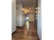 Hallway with wood flooring, dark trim, and recessed lighting at 7627 Venetian Way, Indianapolis, IN 46217