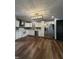 Spacious kitchen with stainless steel appliances, white cabinetry, and ample counter space at 7627 Venetian Way, Indianapolis, IN 46217