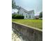Quaint home with neat lawn, featuring a classic design and trimmed hedges on an overcast day at 803 W 12Th St, Anderson, IN 46016