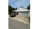 View of garage and covered parking, showcasing the functional outdoor space and convenient vehicle storage at 803 W 12Th St, Anderson, IN 46016