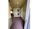 Enclosed porch with vintage details like beadboard walls, lighting, and neutral tones for a calming transition at 803 W 12Th St, Anderson, IN 46016