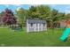 Backyard featuring a shed, playset and trampoline at 830 Black Rock Cir, Lebanon, IN 46052