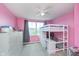 Bright bedroom with bunk beds, a ceiling fan, and colorful decor at 830 Black Rock Cir, Lebanon, IN 46052