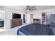 Spacious main bedroom featuring a walk-in closet, neutral carpet, and stylish furnishings at 830 Black Rock Cir, Lebanon, IN 46052
