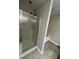 Bathroom featuring walk-in shower with glass door at 8306 Hunters Meadow Way, Indianapolis, IN 46259