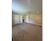 Spacious bedroom featuring neutral walls, carpet, ceiling fan, and access to walk-in closet at 8306 Hunters Meadow Way, Indianapolis, IN 46259