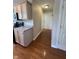 Modern kitchen offering clean sightlines to the hallway at 8306 Hunters Meadow Way, Indianapolis, IN 46259
