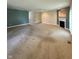 Spacious living room with multiple paint colors and a fireplace at 8306 Hunters Meadow Way, Indianapolis, IN 46259