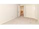 This bedroom features carpet floors, neutral paint and a closet at 8980 Cinnebar Dr, Indianapolis, IN 46268