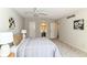 This primary bedroom features carpet floors, ceiling fan, and ensuite bathroom at 8980 Cinnebar Dr, Indianapolis, IN 46268