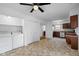 Combined laundry area and kitchen with washer, dryer, and ample storage space at 916 Ardsley Dr, Indianapolis, IN 46234