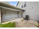 Outdoor patio featuring concrete, air conditioner, and privacy fence at 916 Ardsley Dr, Indianapolis, IN 46234