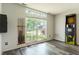 Bright bonus room with new floors, large window and an Arachnid electronic dartboard at 925 Mallory Pkwy, Franklin, IN 46131
