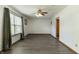 Light-filled living room featuring neutral walls, new floors, and a large window at 925 Mallory Pkwy, Franklin, IN 46131