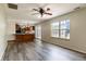 Bright and open living room flowing into the kitchen with ample natural light at 925 Mallory Pkwy, Franklin, IN 46131