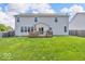 Spacious backyard with well-maintained lawn and a deck for outdoor enjoyment at 9712 Brooks Dr, McCordsville, IN 46055