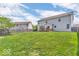 Large backyard with lush lawn and a deck, perfect for outdoor activities and entertaining at 9712 Brooks Dr, McCordsville, IN 46055