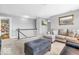 Upstairs living room offers ample seating and connects to an adjacent bathroom at 9712 Brooks Dr, McCordsville, IN 46055