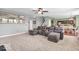 Spacious living room showcasing an oversized sectional couch, providing ample seating for Gathering and friends at 9712 Brooks Dr, McCordsville, IN 46055