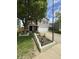 Charming two-story home featuring neutral siding, black shutters, and a well-maintained front yard with mature trees at 98 Frostwood Ln, Greenwood, IN 46143