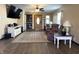 Inviting living room with hardwood floors, ceiling fan, and plenty of natural light at 98 Frostwood Ln, Greenwood, IN 46143