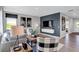 Cozy living room featuring modern furniture, a television, and stylish decor at 10817 Soda Creek Ct, Indianapolis, IN 46239