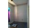 Bedroom features patterned trim, an electrical outlet, and purple curtain at 1131 S Pershing Ave, Indianapolis, IN 46221