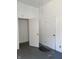 A view of the bedroom, showing a white interior, and doors at 1131 S Pershing Ave, Indianapolis, IN 46221
