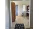 Entering the living room you see a curtained window and classic clock at 1131 S Pershing Ave, Indianapolis, IN 46221