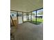 View of a partially enclosed patio with a view of the backyard at 1131 S Pershing Ave, Indianapolis, IN 46221