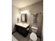 Modern bathroom featuring a sleek vanity, stylish mirror, and contemporary fixtures at 11506 Hidden Bay, Indianapolis, IN 46236