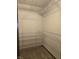 Empty closet features white wire shelving at 11506 Hidden Bay, Indianapolis, IN 46236