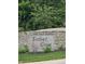 Stone community entrance sign with the name 
