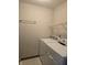 Laundry room features tile floors, a towel rack, and a washer/dryer at 11506 Hidden Bay, Indianapolis, IN 46236
