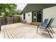 Outdoor deck with seating, offering a relaxing space for outdoor living and entertaining at 1240 E 56Th St, Indianapolis, IN 46220