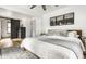 Well-decorated bedroom with stylish decor, neutral tones, and a comfortable bed, perfect for relaxation at 1240 E 56Th St, Indianapolis, IN 46220