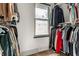Walk-in closet with ample storage and natural light from a window, providing a bright and organized space at 1240 E 56Th St, Indianapolis, IN 46220