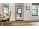 Bright dining space with hardwood floors, natural light, and view of back yard at 1240 E 56Th St, Indianapolis, IN 46220
