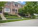 Charming brick townhome with front door, landscaping, and welcoming front porch at 13094 Overview Dr # 5D, Fishers, IN 46037