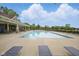 Community pool with ample seating and sun loungers for residents to enjoy at 13094 Overview Dr # 5D, Fishers, IN 46037